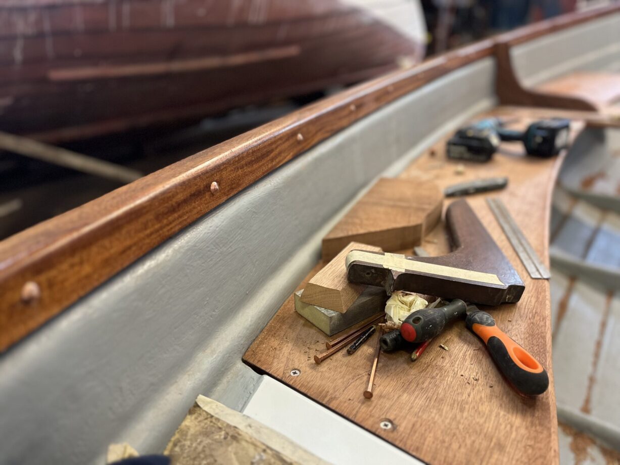 Wood working tools being used to make boat repairs in the Saltmarsh boatyard